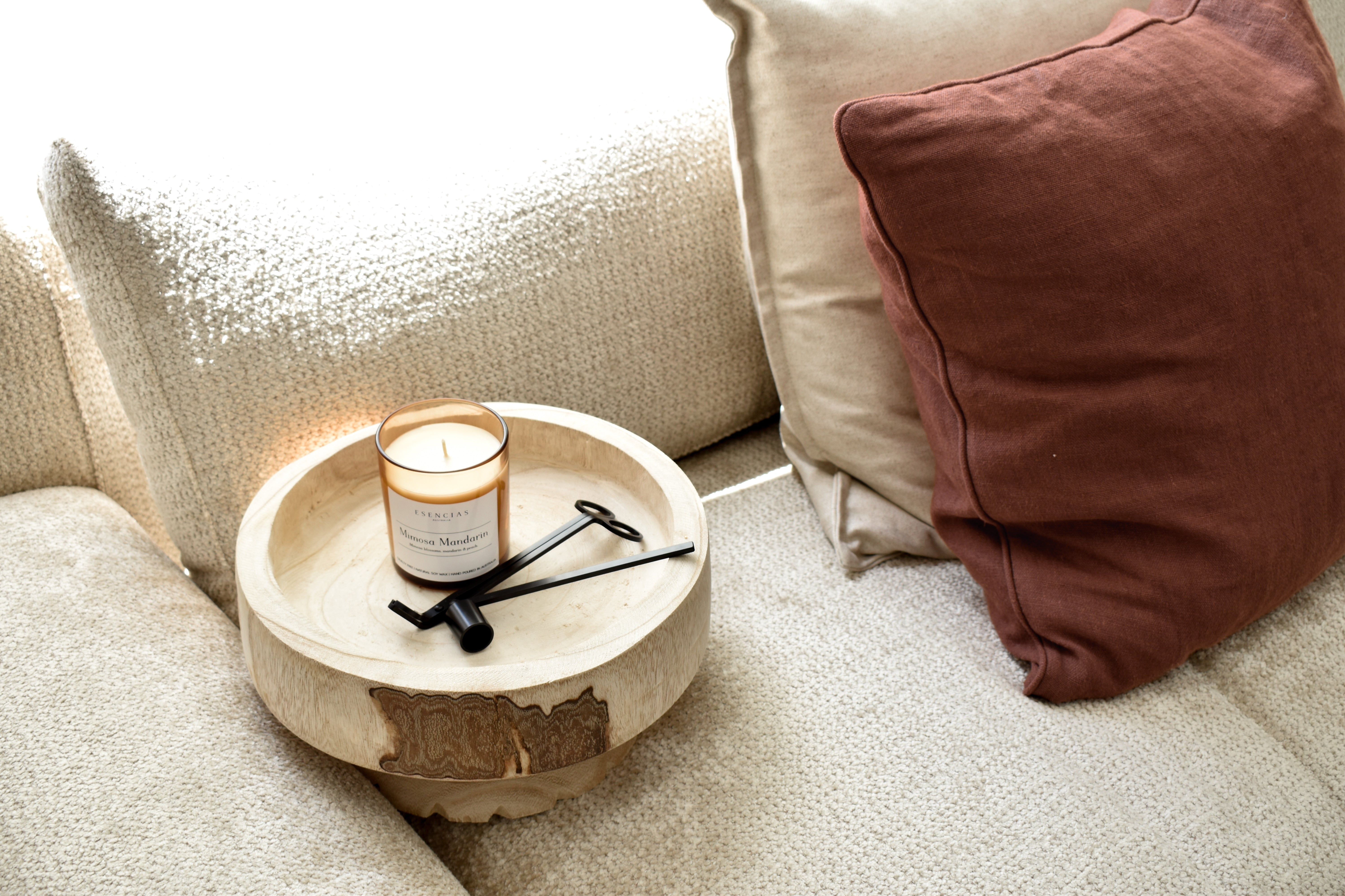 Mimosa Mandarin candle styled in a bright lifestyle setting, evoking fresh, citrusy warmth and uplifting energy.