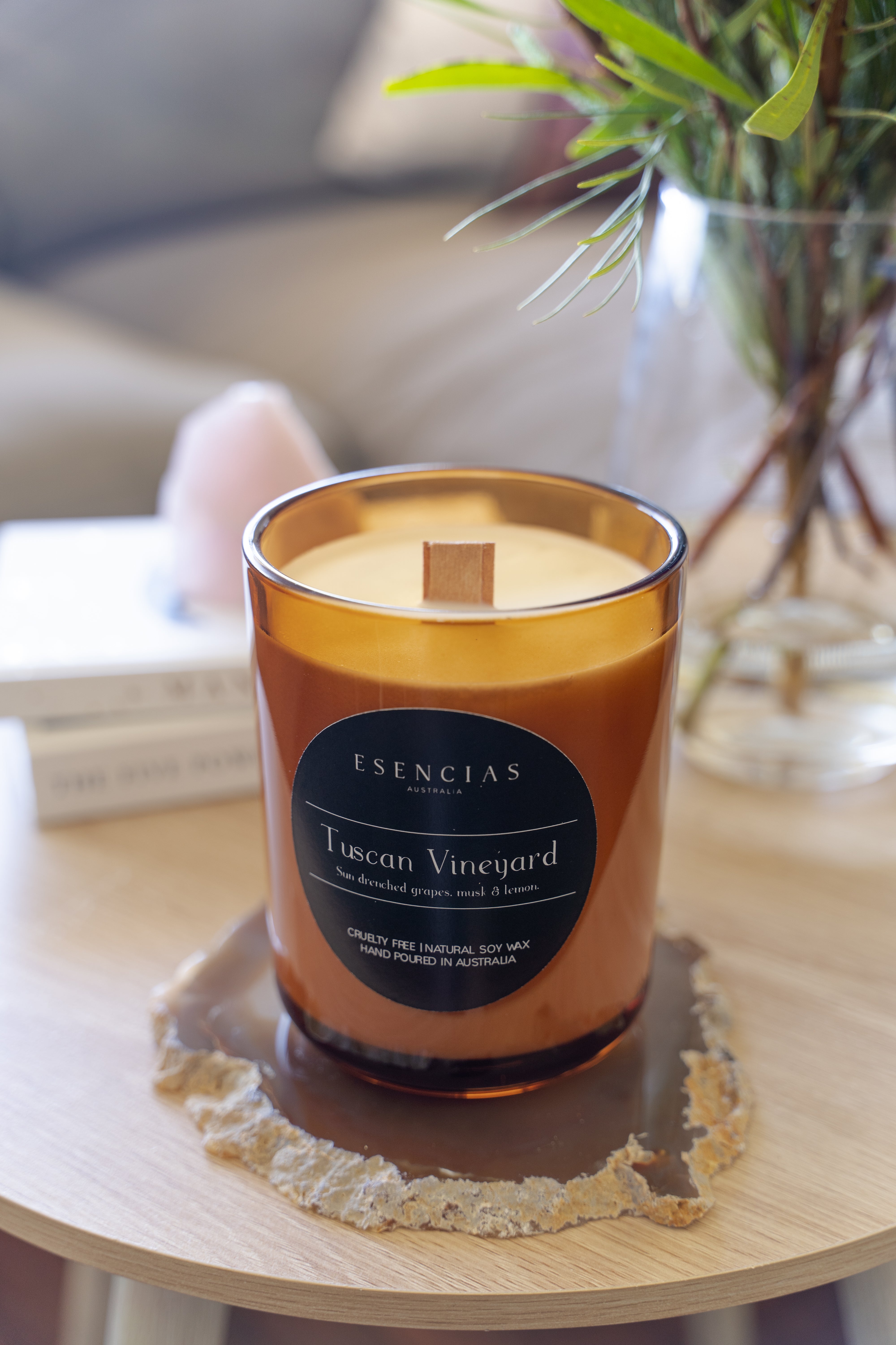 Tuscan Vineyard amber jar candle showcased in a cozy lifestyle setting, radiating sophisticated warmth and timeless elegance.