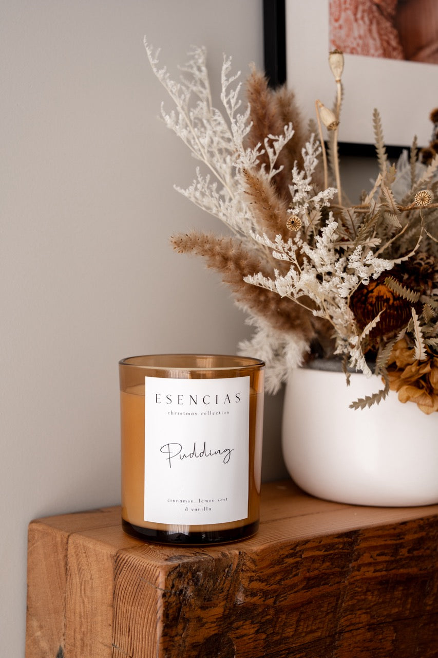 Christmas Range Pudding styled on timber shelf with flowers. 