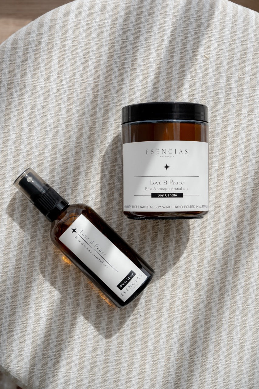Love & Peace Soy Candle & Room Spray styled simply and elegantly. 