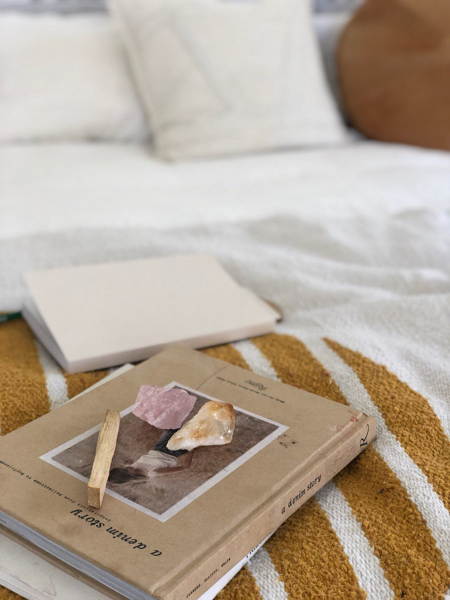 Calming shot of Palo Santo and crystals.