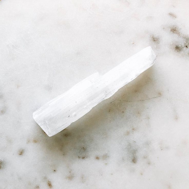 Selenite raw wand for cleansing energy.