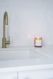 Bathroom lifestyle shot of the Tuscan Vineyard soy candle from the Signature range 