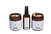 Angelic Radiance bundle featuring candle, spray and soak scrub displayed in a clean, product-focused image highlighting elegance and purity.