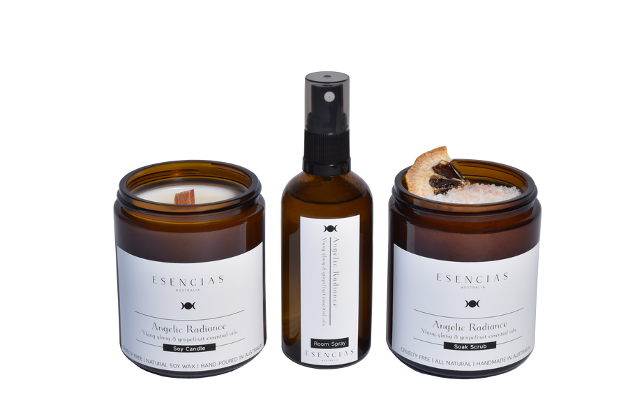 Angelic Radiance bundle featuring candle, spray and soak scrub displayed in a clean, product-focused image highlighting elegance and purity.