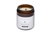 Calming and Intuition candle displayed in a clean, product-focused shot highlighting its elegant design and soothing presence.