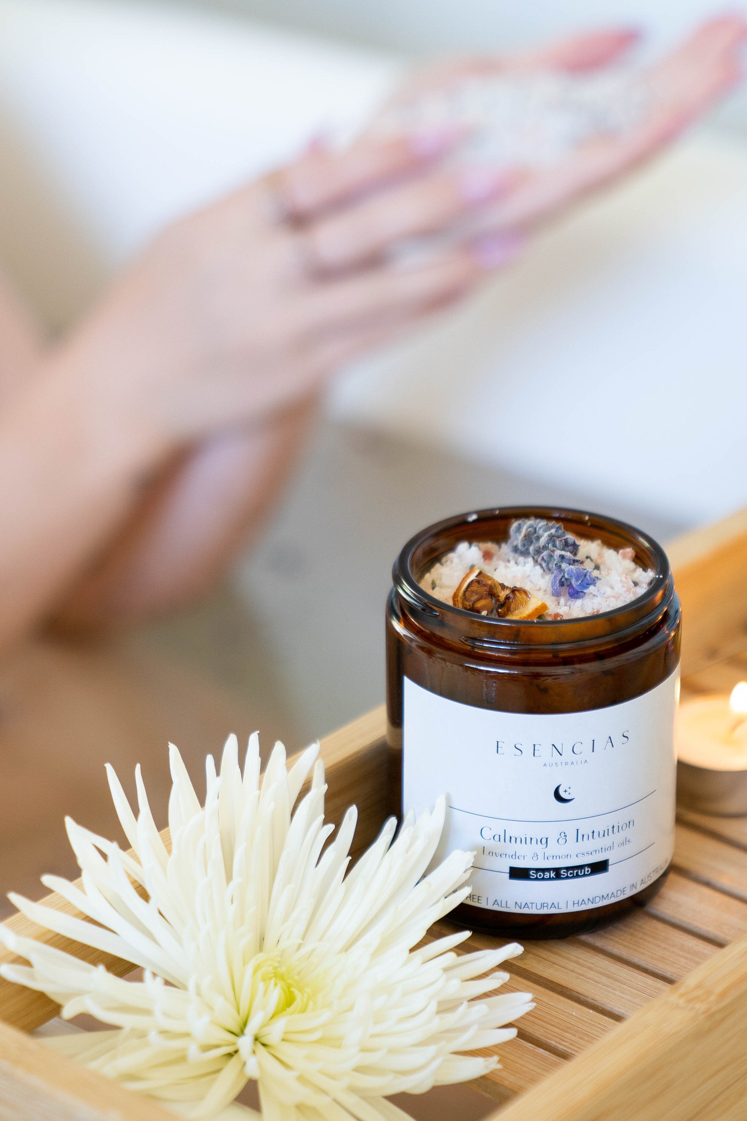 Calming and Intuition soak scrub displayed in a serene bathroom setting, evoking relaxation and soothing self-care.