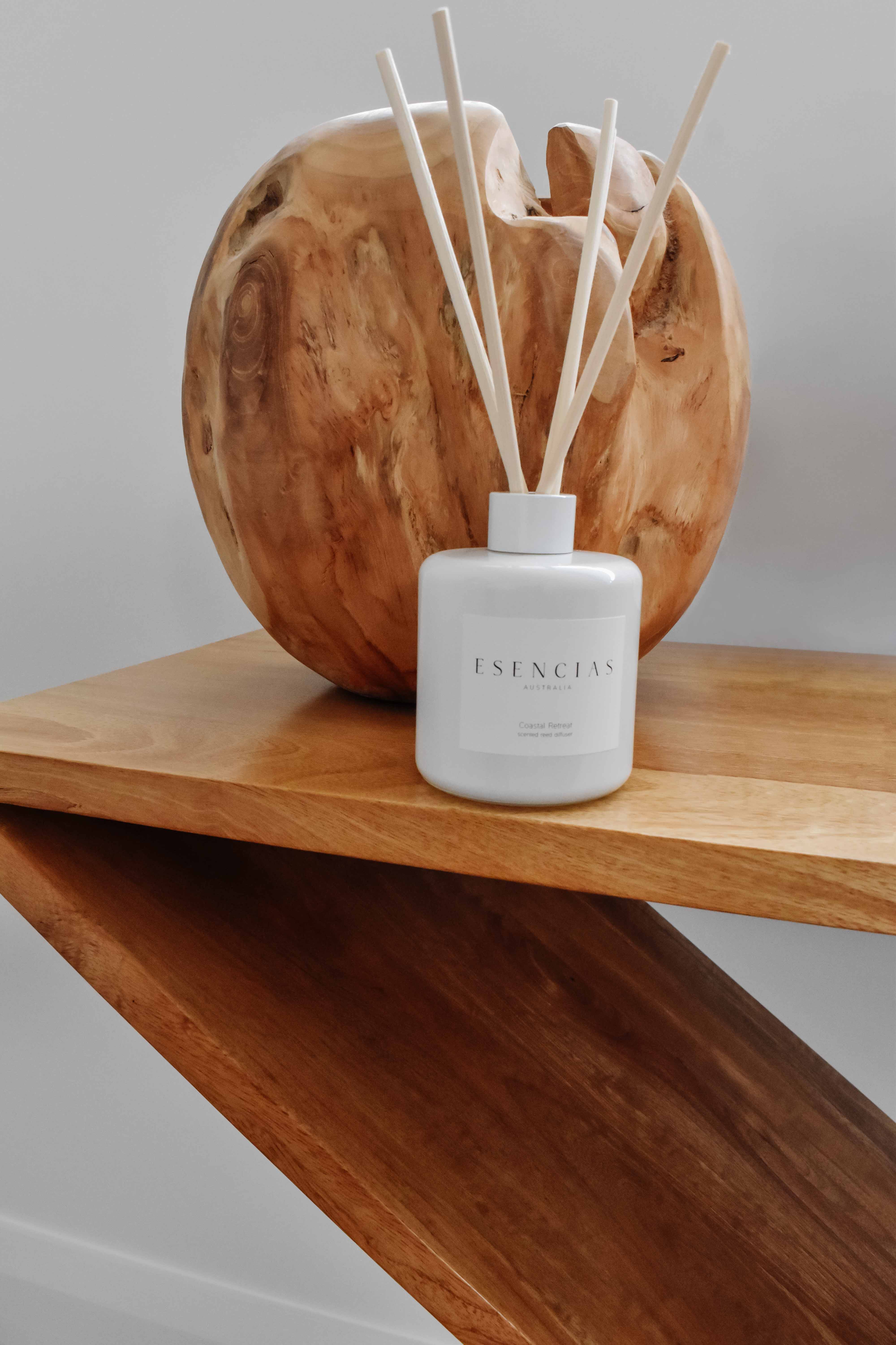 Coastal Retreat reed diffuser displayed in a lifestyle setting, evoking fresh ocean air and serene coastal vibes.