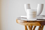 Coastal Retreat soy candle showcased in a lifestyle image, highlighting its calming coastal ambiance and natural elegance.