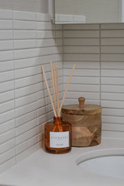 Esencias Blood Orange scented reed diffuser in amber glass jar
