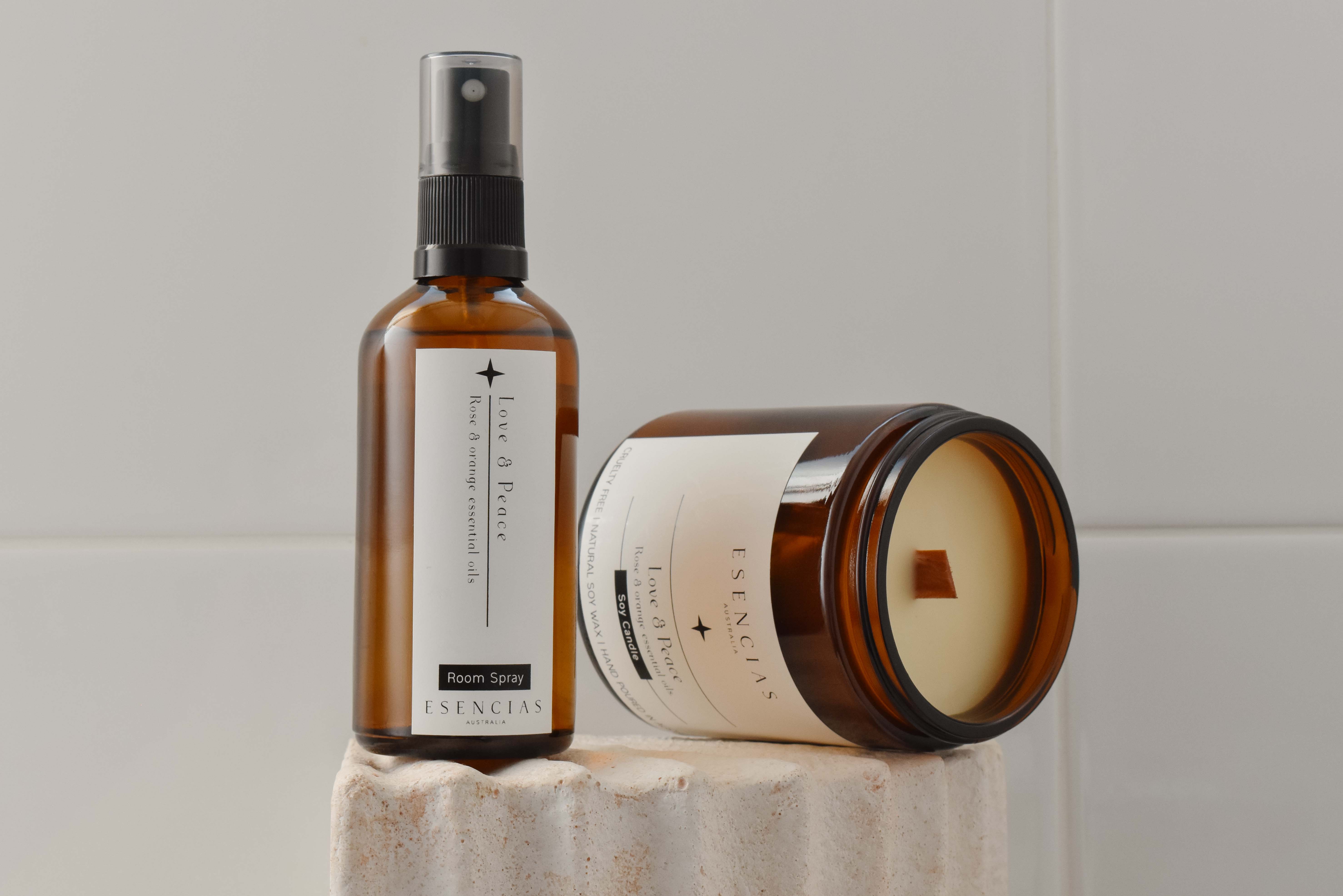 Love and Peace candle and room spray shown in a clean, product-focused image, highlighting their elegant design and soothing, heart-centred energy.