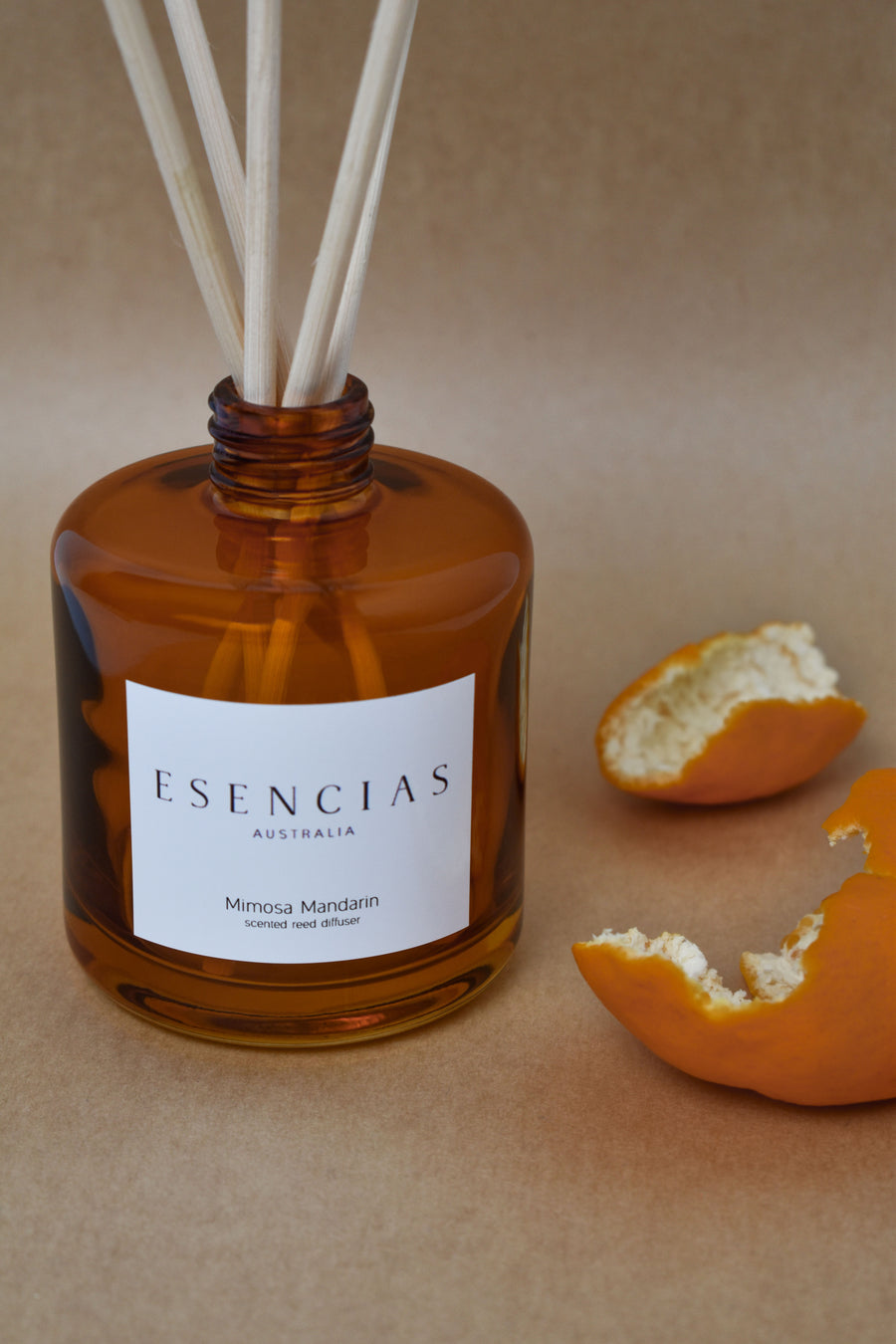 Mimosa Mandarin reed diffuser in amber jar shown in a clean product-focused image, highlighting its elegant design and fresh, uplifting scent.