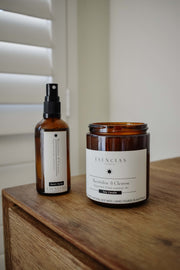 Revitalise and Cleanse candle and room spray styled in a lifestyle setting, evoking freshness, clarity and uplifting energy.